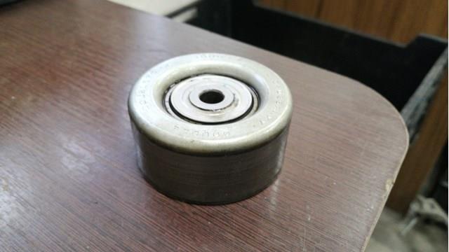 Ролик приводного ременя, паразитний 166030C013 TOYOTA