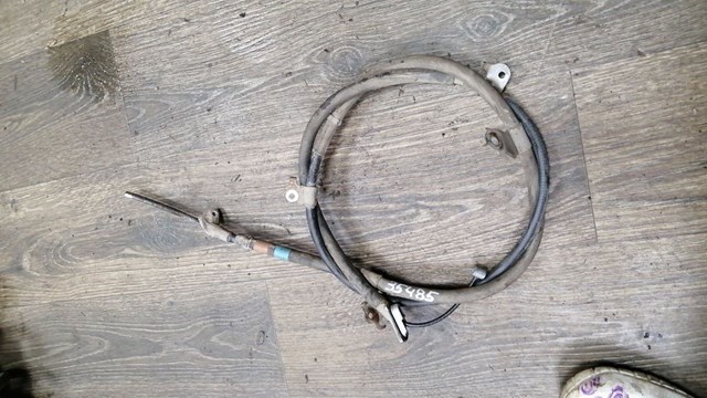 Трос стоянкового гальма задній правий 464200R013 TOYOTA