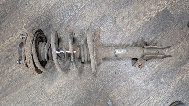 Подушка амортизатора переднього 543208H310 NISSAN