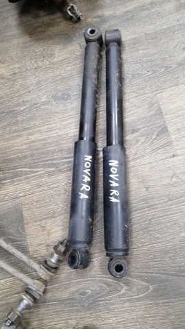 Амортизатор задньої підвіски 56200EB30A NISSAN