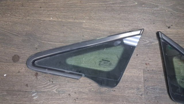 Скло трикутне дверей передніх лівоих 73371SNLT00 HONDA