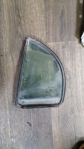 Кватирка дверей трикутник, задньої, лівої 73455SNLT00 HONDA