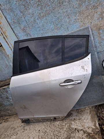 Двері задні, ліві 821003885R RENAULT