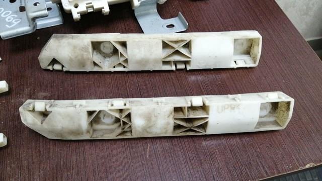 Кронштейн бампера заднього, лівий 852211BA0A NISSAN