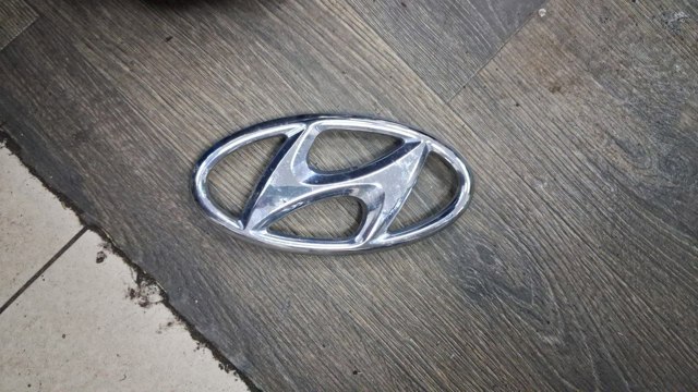 Фірмовий значок решітки радіатора 86354J9000 HYUNDAI