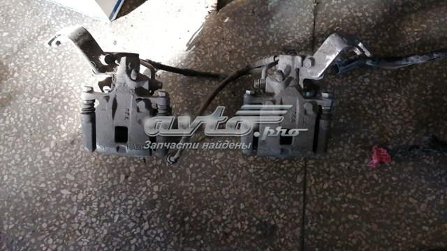 Супорт гальмівний задній правий D1Y12698Z MAZDA