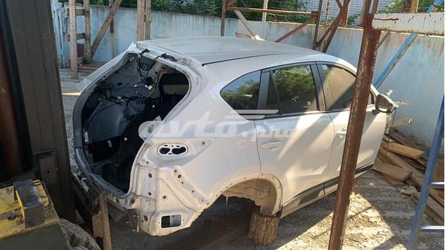 Крило заднє праве KDY370410C MAZDA