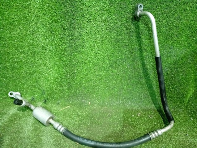 Трубка кондиціонера від компресора до радіатора 22876350 GM