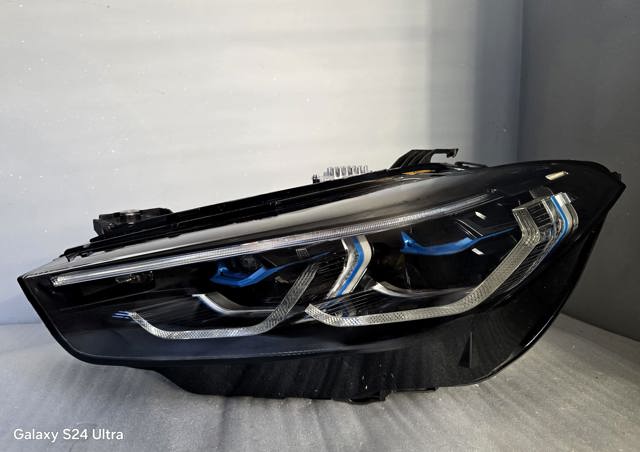 Фара ліва 63118084891 BMW