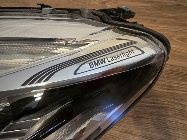 Фара основна ліва 7408703 BMW