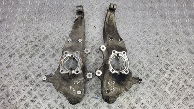 Кулак поворотний передній лівий 31206884385 BMW