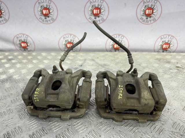 Супорт гальмівний задній правий 440011LB0A NISSAN