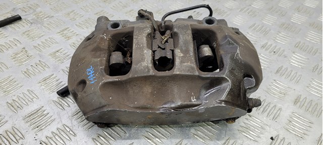 Задній гальмівний супорт лівий 7P6615423E VAG