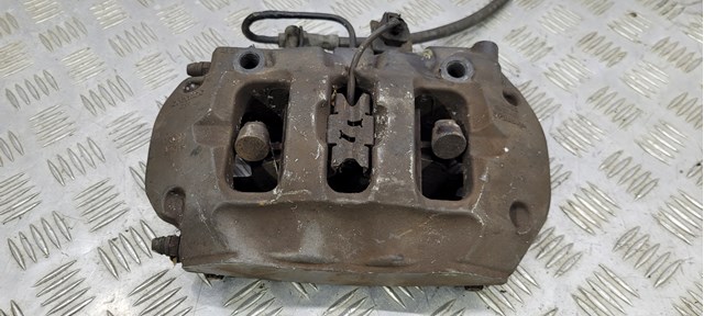 Супорт гальмівний задній правий 7P6615424D VAG