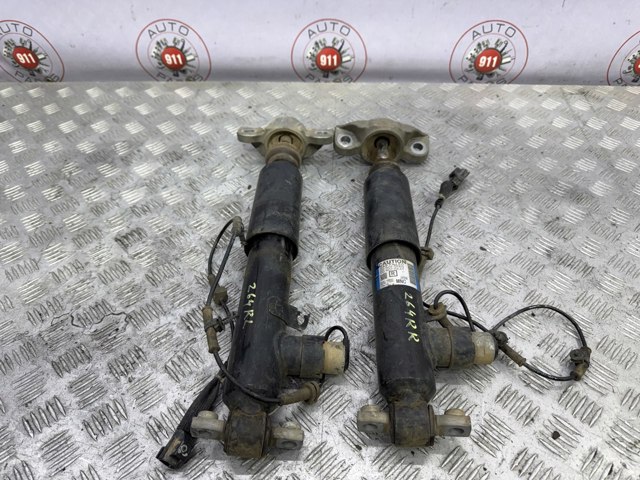 Амортизатор задній, правий EG9Z18125D FORD