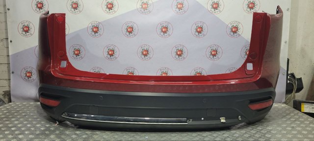 Буфер (бампер) задній TK5150221DBB MAZDA