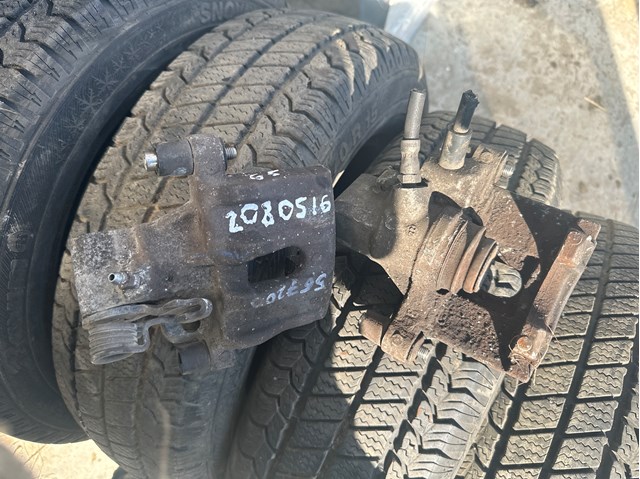 Задній гальмівний супорт лівий 2080516 FORD