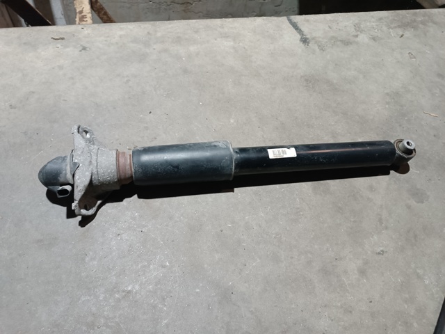 Стійка амортизатора задня 4KE616025F VAG