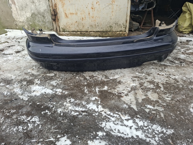 Кожух бампера заднього T0Y250221 MAZDA