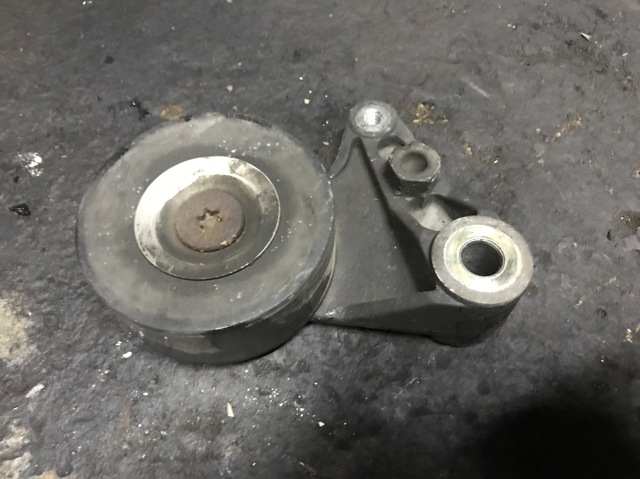 Натягувач приводного ременя 117502W202 NISSAN