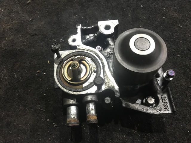 Насос системи охолодження 21111AA340 SUBARU