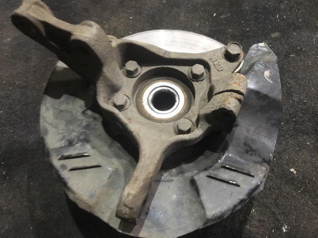 Захист гальмівного диска переднього 26290AG000 SUBARU