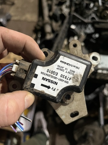 Датчик поздовжнього прискорення 47930EQ010 NISSAN