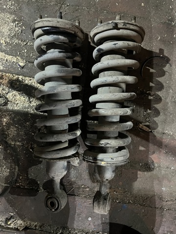Амортизатори передні 56100EB31E NISSAN