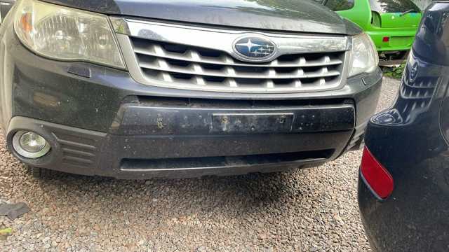 Бампер передній 57704SC000 SUBARU