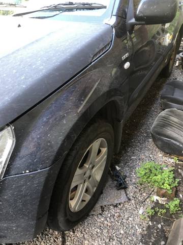 Бічна частина передня ліва 5771065J10 SUZUKI