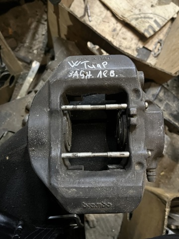 Задній гальмівний супорт лівий 7L6615423J VAG