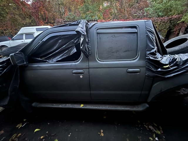 Двері пасажирськи задні ліві 82101EB332 NISSAN