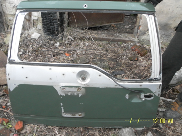 Двері багажника 901000X032 NISSAN
