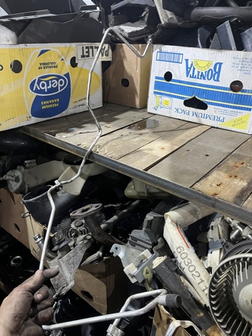 Шланг кондиціонера, від радіатора до випарника 92440EB300 NISSAN