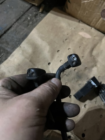 Форсунка омивача скла лобового, ліва 986303E100 HYUNDAI