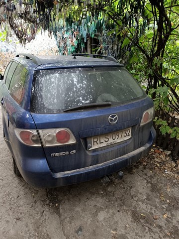 Буфер (бампер) задній G21B50221G8H MAZDA