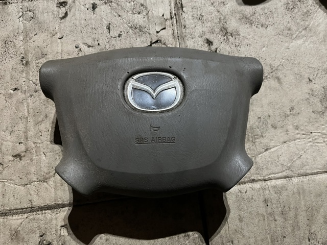Подушка в кермі LC6357K00A05 MAZDA