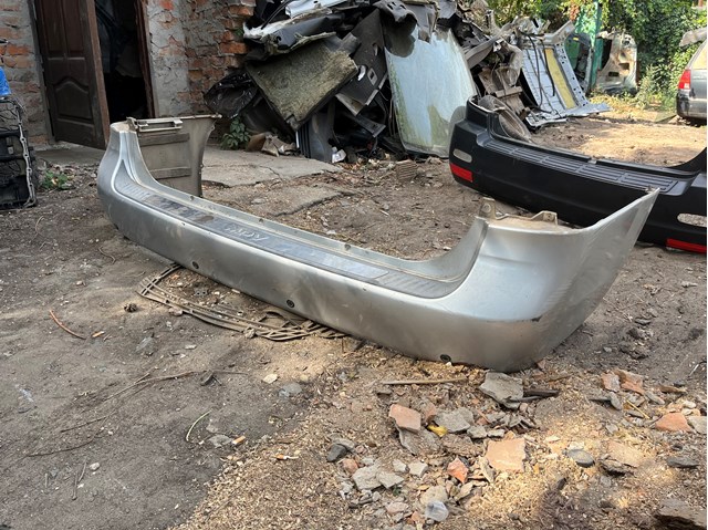 Бампер задній LC7050221DAA MAZDA