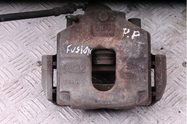 Супорт гальмівний, передній, правий 1126290 FORD