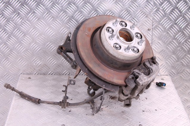 Цапфа - поворотний кулак задній, правий 2338664 FORD
