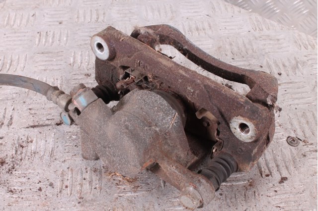 Задній гальмівний супорт лівий 26692FG010 SUBARU