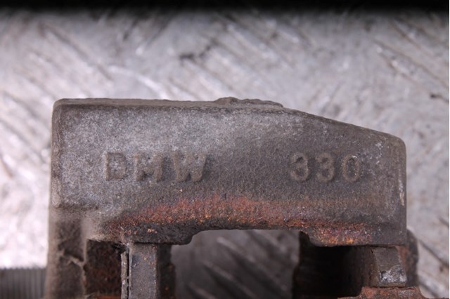 Супорт гальмівний, передній, правий 34116799466 BMW
