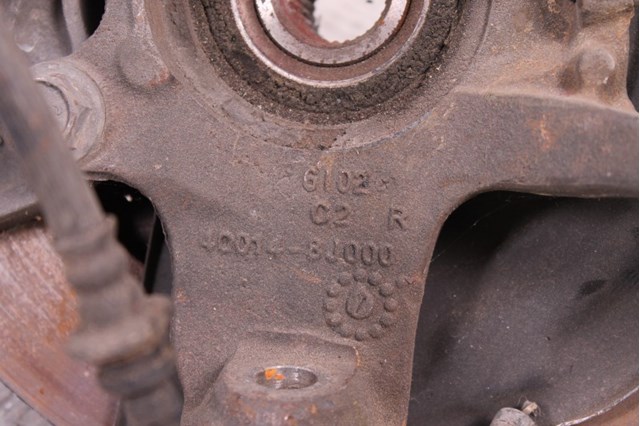Цапфа поворотна права 400148J000 NISSAN