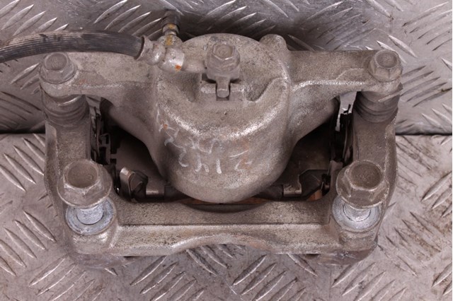 Супорт тормзной 410114BT0A NISSAN