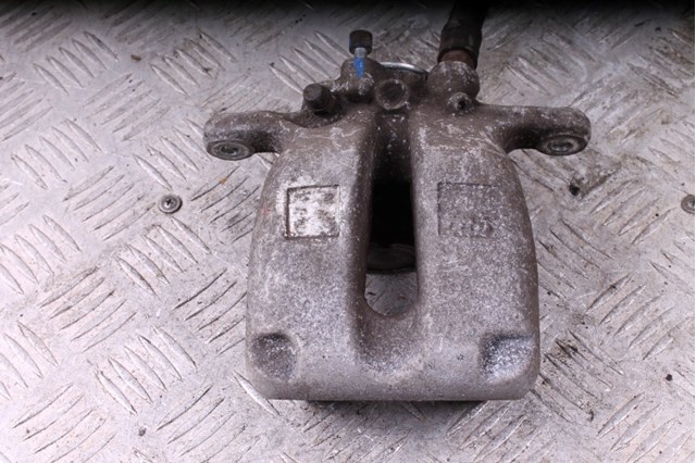 Задній гальмівний супорт лівий 4F0615403A VAG