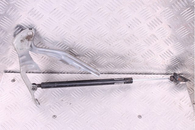 Стійка капота 57251FG010 SUBARU