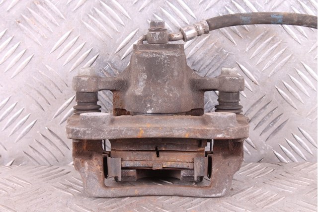 Супорт гальмівний задній правий 58230C1150 HYUNDAI