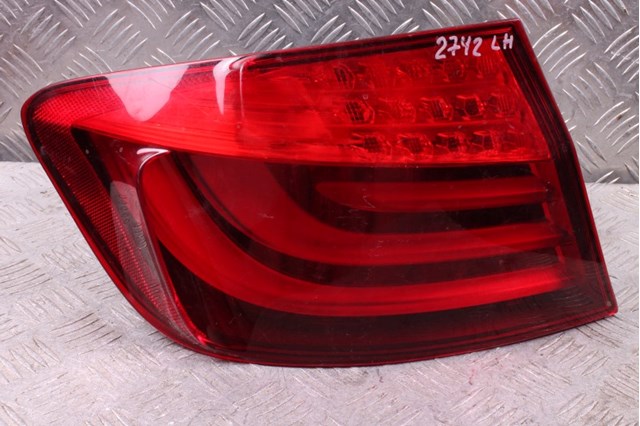 Ліхтар задній лівий, зовнішній 63217203231 BMW