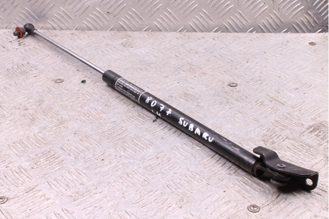Амортизатор двері п'ятої 63269FG030 SUBARU