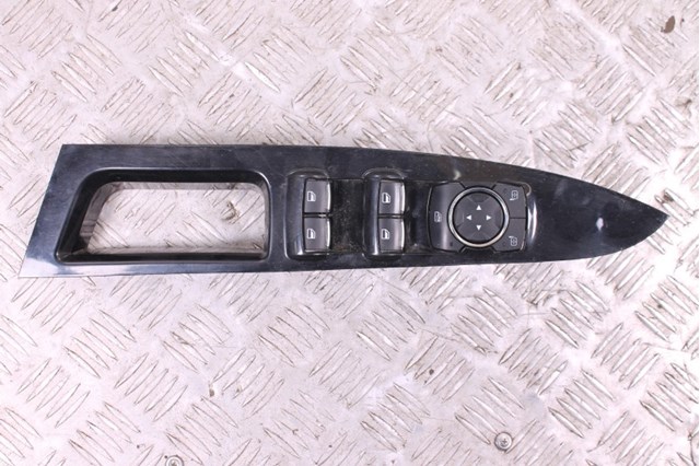 Кнопки переднього лівого склопід'ємника DG9T14540ABW FORD